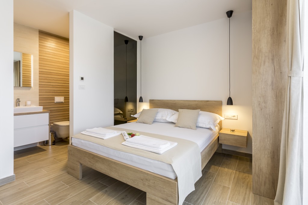 Room 2 - Double Bed, Bathroom, Sat-TV, Wardrobe, Working Table, Towel and Sheets, AC, Balcony With Sea View