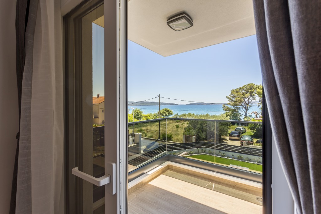 Room 1 - Double Bed, Bathroom, Sat-TV, Wardrobe, Working Table, Towel and Sheets, AC, Balcony With Sea View