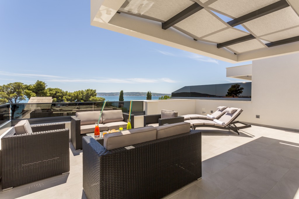 Terrace on Top of The Villa With Jacuzzi, Rattan Furniture and Sunbeads