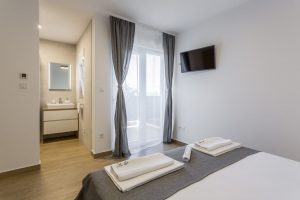 Room 1 - Double Bed, Bathroom, Sat-TV, Wardrobe, Working Table, Towel and Sheets, AC, Balcony With Sea View