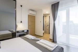 Room 1 - Double Bed, Bathroom, Sat-TV, Wardrobe, Working Table, Towel and Sheets, AC, Balcony With Sea View