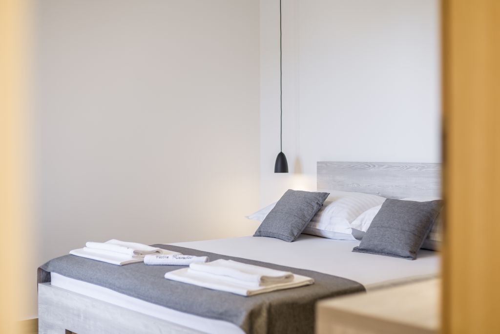 Room 1 - Double Bed, Bathroom, Sat-TV, Wardrobe, Working Table, Towel and Sheets, AC, Balcony With Sea View